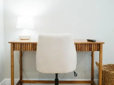 a white chair sitting in front of a desk at Sweet Bay on 30A in Seagrove Beach