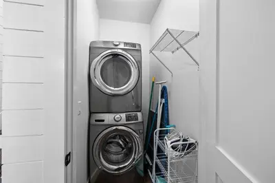 a washer and dryer in a laundry room at Southern Comfort in Seacrest