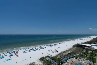 an aerial view of a beach with many people at 1BR Sleeps 5 at The Summit with Ocean Front Views in Panama City Beach