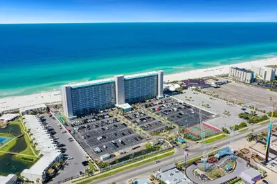 an aerial view of a hotel and the beach at 1BR Sleeps 5 at The Summit with Ocean Front Views in Panama City Beach