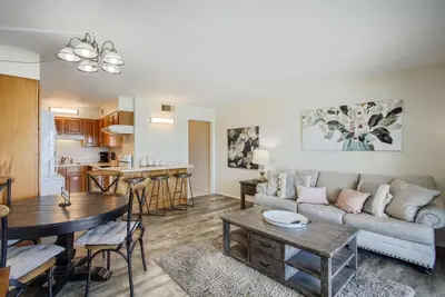 a living room with a couch and a table at Ocean View Retreat - Beachfront Bliss in Panama City Beach