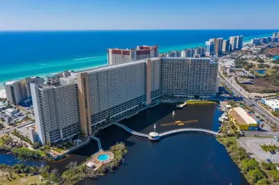 an aerial view of a resort near the ocean at Seaside Harmony - Stunning High-Rise Resort Condo in Panama City Beach