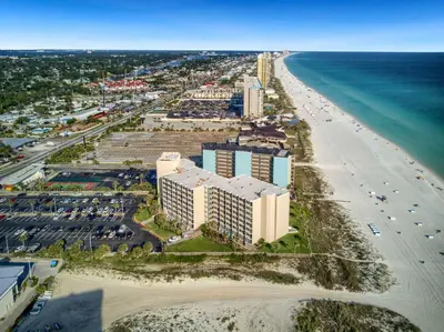 an aerial view of a resort and the beach at Seaside Villa - Ocean View Studio in Panama City Beach