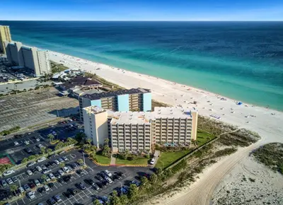 an aerial view of a resort and the beach at Seaside Villa - Ocean View Studio in Panama City Beach