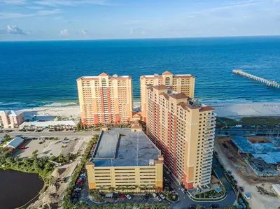 an aerial view of a resort near the ocean at Sandy Feet Retreat - Ocean View Condo in Panama City Beach