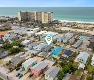 an aerial view of a city with a parking lot at Beach Time Cozy Retreat Steps from the Gulf in Panama City Beach
