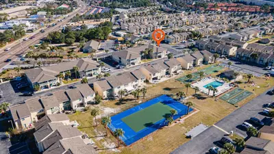 an aerial view of a house with a swimming pool at The Turtle Nest - Resort Condo with Pool in Panama City Beach