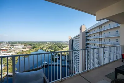 a balcony with a view of a body of water at Whitesands Retreat - Incredible Resort Home in Panama City Beach