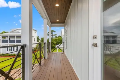 a porch with a view of a house at 224 W Willow Mist Rd in Inlet Beach