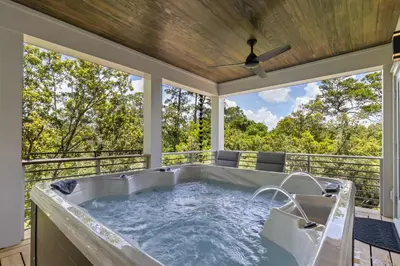 a hot tub on the back porch of a house at New 30A Retreat Beach Access Hot Tub & Guest Suite in Seacrest