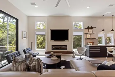 a living room with a couch and a tv at New 30A Retreat Beach Access Hot Tub & Guest Suite in Seacrest