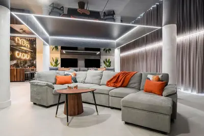 a living room with a couch and a table at The Summit Penthouse 1501 in Panama City Beach
