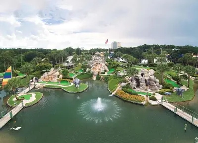 an aerial view of a water park with a fountain at Luxe Gulf Front View with Free Beach Chairs, Balcony, & Resort Amenities in Panama City Beach