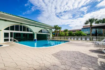 a large swimming pool in front of a building at Celadon 203 in Panama City Beach
