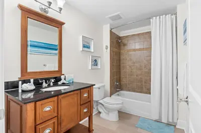a bathroom with a sink and a toilet and a shower at Sterling Breeze Unit 2106 in Panama City Beach