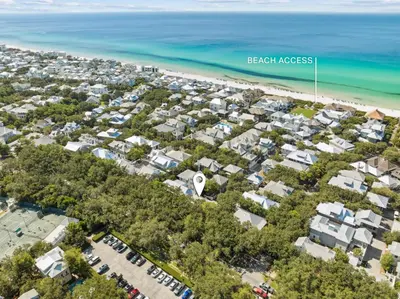 an aerial view of a beach with houses and the ocean at 90 N Cartagena Carriage House by 30A Escapes in Rosemary Beach