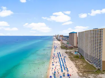 an aerial view of a beach and the ocean at Emerald Beach Resort 1734 - Amazing Views, Beachfront, King Bed, 3 Pools, Starbucks in Panama City Beach