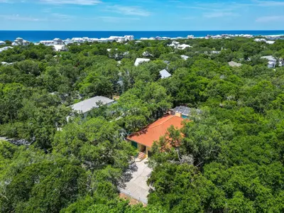 an overhead view of a house with an orange roof at Little Narnia - Colorful Beach House Private Pool in Seacrest