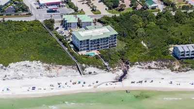 an overhead view of a beach with a building at Legacy 202 in Santa Rosa Beach