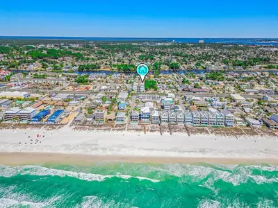 an aerial view of a beach with a hot air balloon at Dog-Friendly 3BR Beach Retreat | Walk to Shore & Community Pool in Panama City Beach