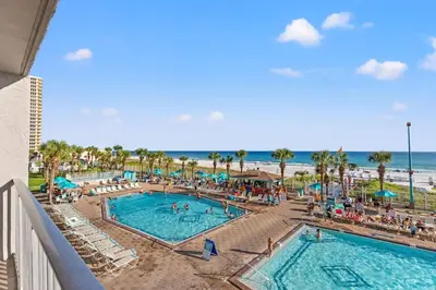 a view of the pool and beach at a resort at The Summit 315 in Panama City Beach