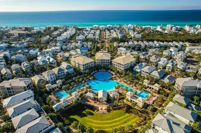 an aerial view of a resort with the ocean at Lagoon Lounge in Seacrest