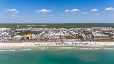 an aerial view of a beach with buildings and the ocean at Lagoon Lounge in Seacrest