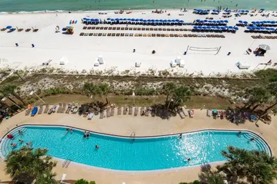 an overhead view of the beach and swimming pool at a resort at Calypso 1-1805 by Emerald Coast Retreats in Panama City Beach