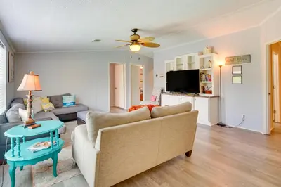 a living room with a couch and a table at 2 Blocks to Beach! Family-Friendly Home in PCB in Panama City Beach