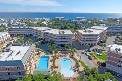 an aerial view of a resort with a swimming pool at The Rosemary Pearl - Pool & Free Beach Shuttle in Seacrest