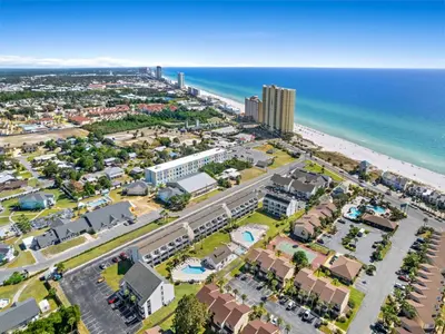 an aerial view of a city and the beach at Endless Summer #A30 in Panama City Beach