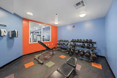 a gym with cardio equipment in a room at Beachfront, Ocean Views, Sleeps 6 , Hot tub in Panama City Beach