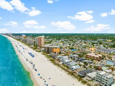 an aerial view of the beach and the ocean at Location! Studio Condo Panama City Beach, Holiday Beach, Tents Allowed! in Panama City Beach