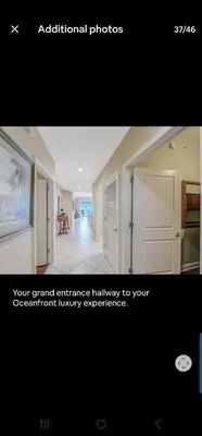 a picture of a room with a hallway with a door at Grandview East in Panama City Beach