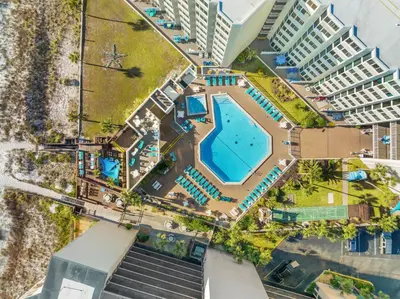 an overhead view of the pool at a resort at Beach Front Ocean View Condo - Top of the Gulf 615 in Panama City Beach