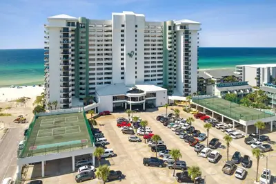 an aerial view of a hotel with a parking lot at It Doesn’t Get Any Better Than This! 2BR 2BA Sleeps 8 Beachfront! in Panama City Beach