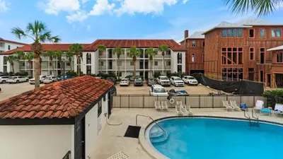 an image of a swimming pool at a resort at Palms B4 in Santa Rosa Beach