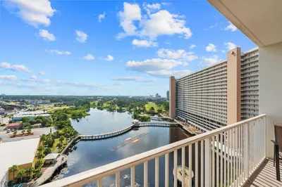 a view from the balcony of a building with a river at Bright & Spacious Condo 1BD! Steps from the Beach! by Dolce Vita Getaways PCB in Panama City Beach