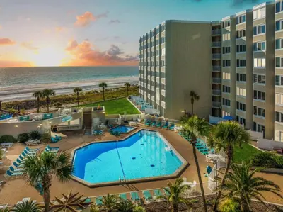 an aerial view of a resort with a pool and the ocean at Renovated Beach Front Condo - Top of the Gulf 302 in Panama City Beach