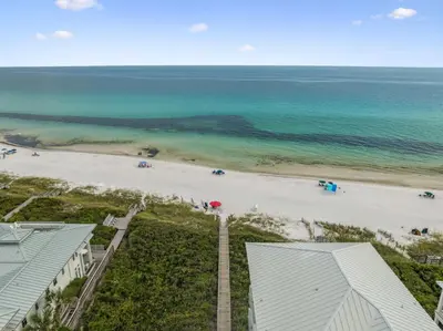 an aerial view of the beach and the ocean at Fore Seasons by 30A Escapes in Seagrove Beach
