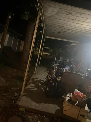 a bike parked in a garage at night at Beach bum in Panama City Beach