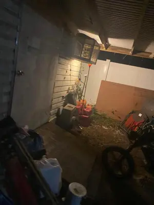 a room with a garage with a brick wall at Beach bum in Panama City Beach