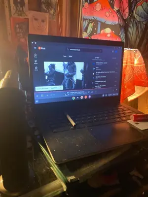 a laptop computer sitting on top of a table at Beach bum in Panama City Beach