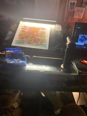 a desk with a laptop and a light on it at Beach bum in Panama City Beach
