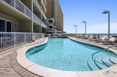a swimming pool in the middle of a building at 1202 Seychelles in Panama City Beach