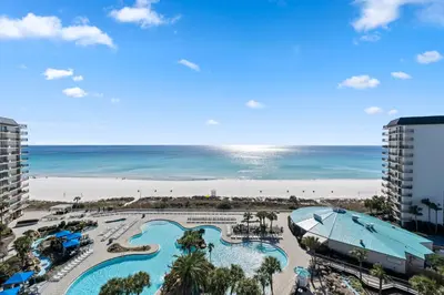a view of a resort with a pool and the beach at 1107 Edgewater T3 Beach Resort in Panama City Beach