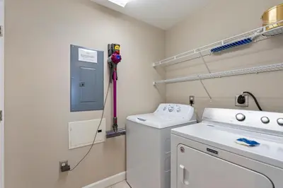 a laundry room with a washer and dryer at 1105 Sterling Beach in Panama City Beach