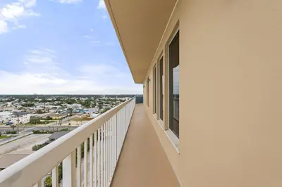 a balcony with a view of a city at 1209 Seychelles in Panama City Beach