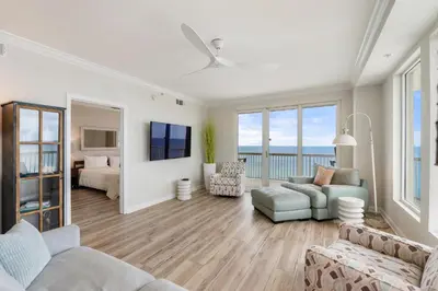 a living room with a view of the ocean at 1209 Seychelles in Panama City Beach