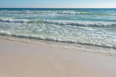 a view of the ocean from the beach at Boardwalk 2205 in Panama City Beach